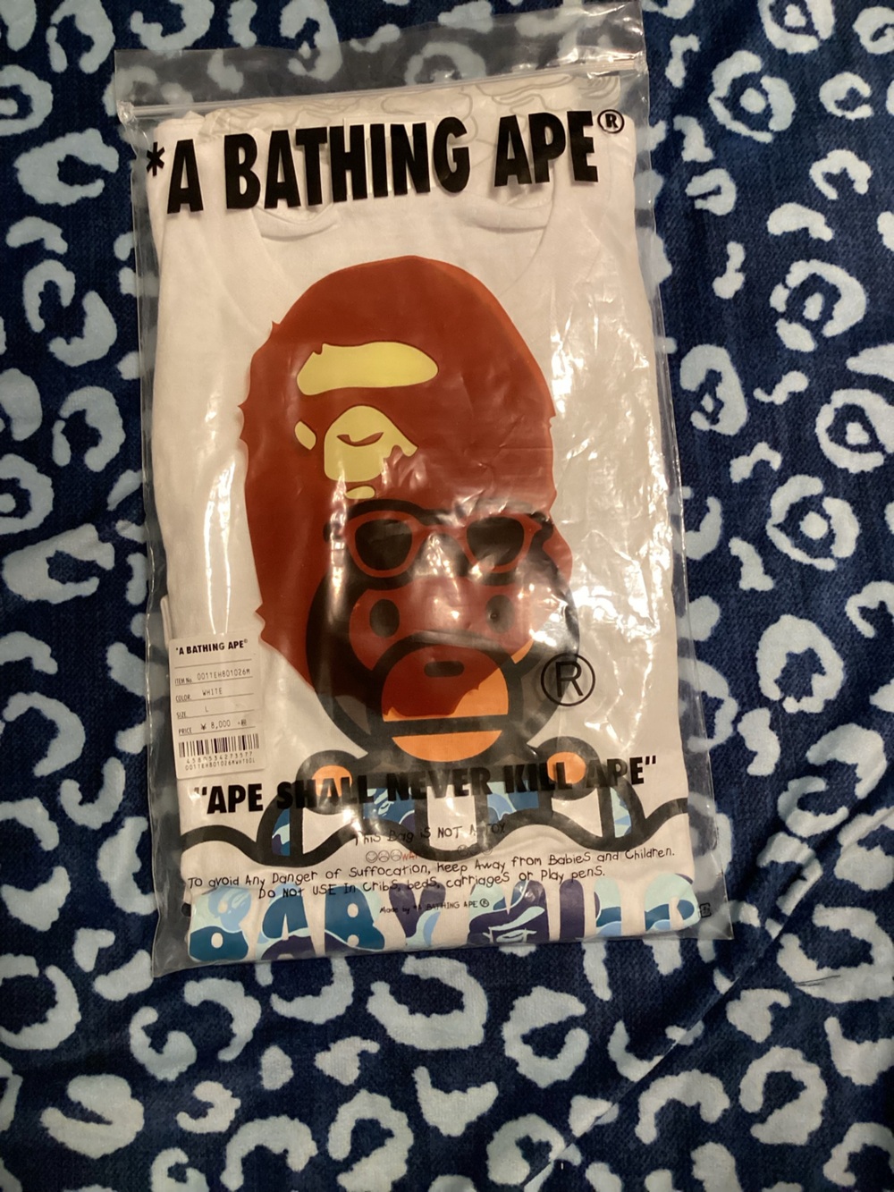 A Bathing Ape Men’s Halloween Graphic Tee — White with Orange Ape Print